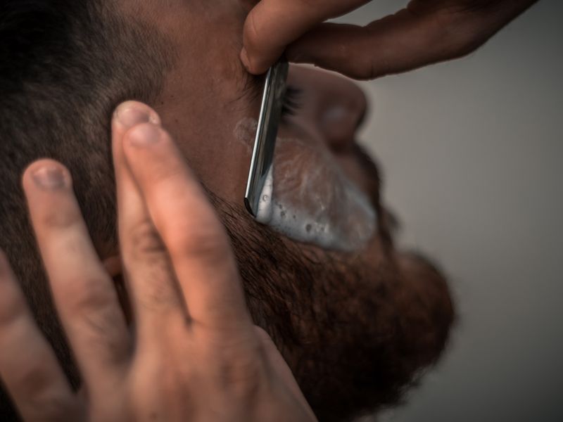 Royal Shave — A hot towel shave fit for a king.